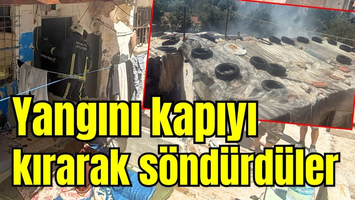 Yangını kapıyı kırarak s&ouml;nd&uuml;rd&uuml;ler 